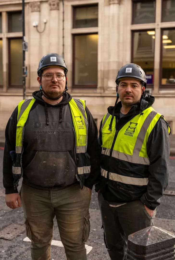 The Masonry Brothers founders in front of a heritage stone building in London